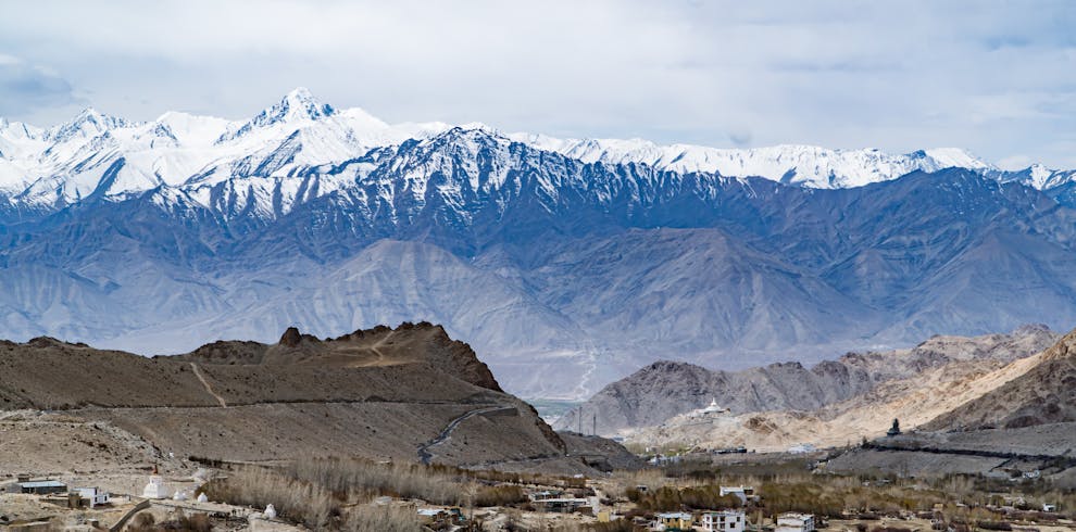 Breathtaking view of snow-capped Himalayan mountains and scenic Leh valley in India.